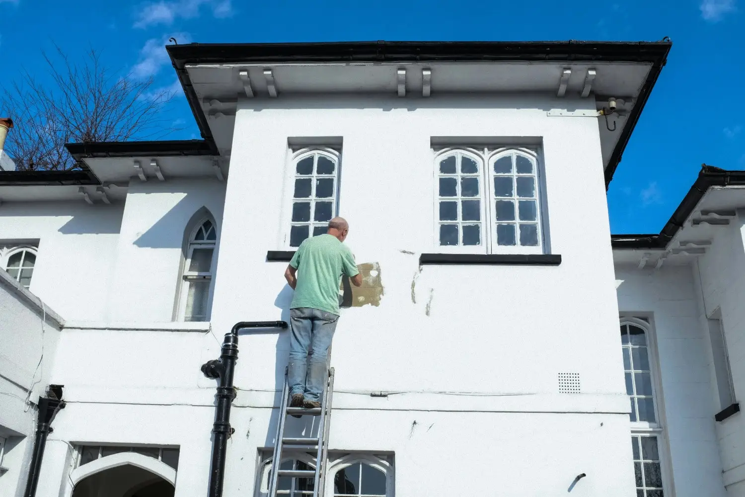 Painting materials and prepared surfaces organized for an A Classic Touch Painting house project in DeBary, FL. House painting near me